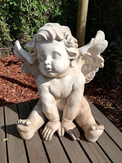 garden cherub sculptures|cherub sculpture for sale.